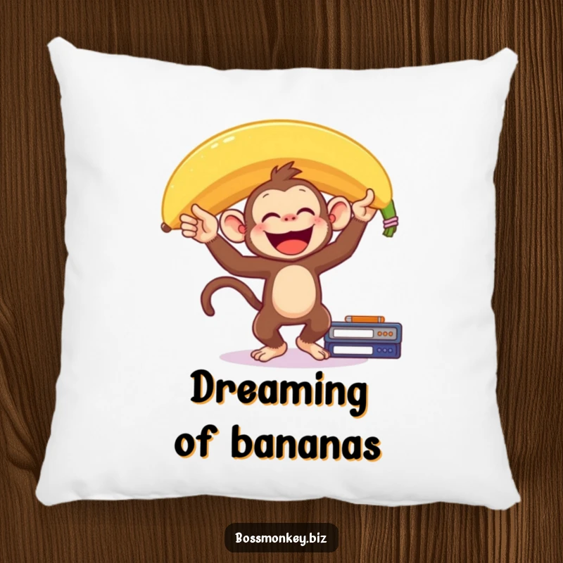 Funny Banana Monkey Pillow: A delighted monkey balances a giant banana on its head on a desk, offering humorous comfort and charm.
