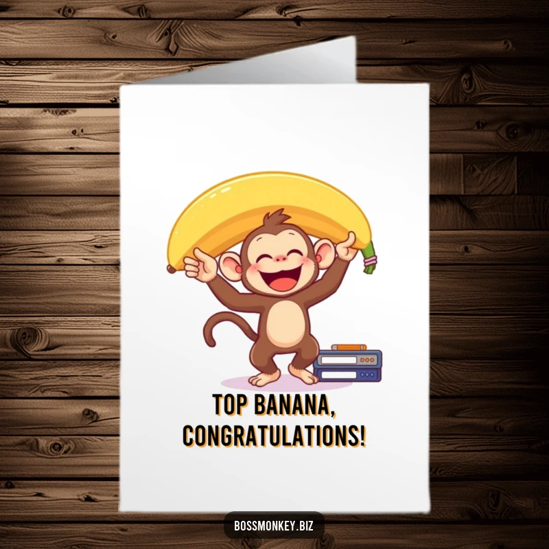 Funny Free Printable Congratulations Card: Delighted monkey balances a giant banana on its head on a desk, celebrating a great success.